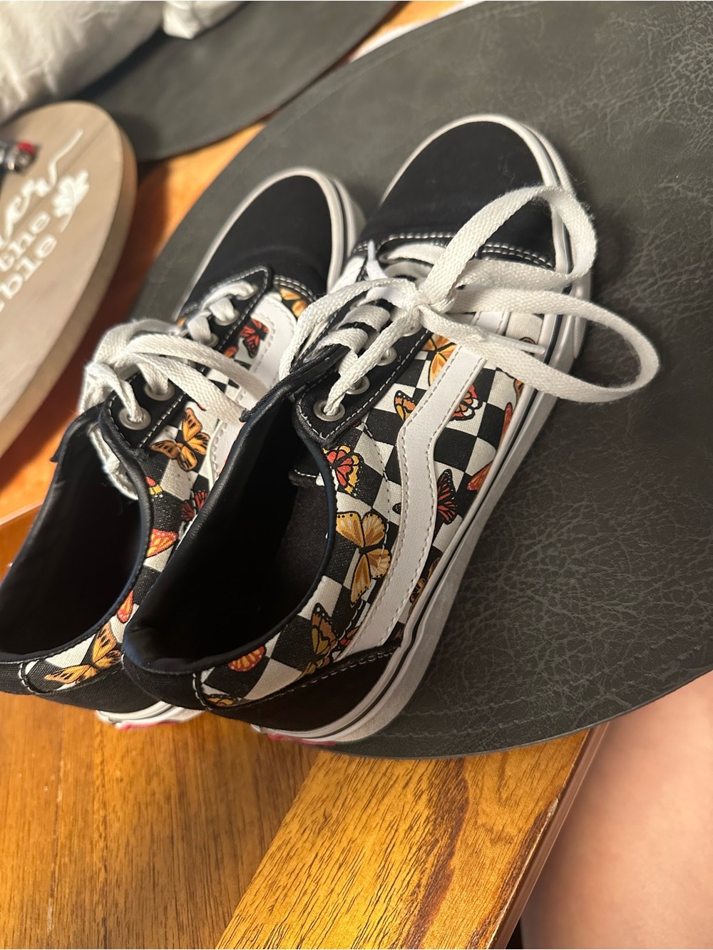 Vans women’s Black Checkerboard Butterfly Low-Top Sneakers with White Stripe